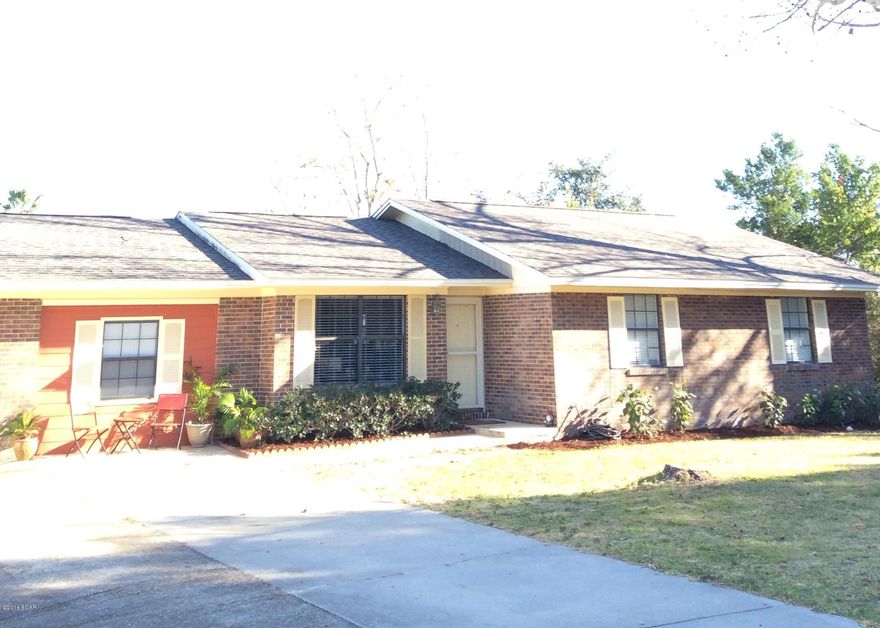 ***OPEN HOUSE Sunday 1/31/16 1-4pm*** Charming 3 Bedroom 2 Bath Brick home located close to Pier Park and 0.7 miles from the beach.  New ROOF installed in 2013 and hot water heater in 2015.  This home was renovated with new laminate flooring, carpet, paint, kitchen countertops, microwave and more. In ground irrigation system that uses reclaimed water, fenced in large back yard, extra concrete parking pad alongside of house.  Large living /dining area, kitchen, and exceptional family room that is 25x 14 with a closet.  This is a sturdy well cared for home and very easy to show.