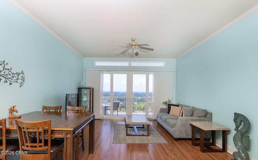 Welcome to Laketown Wharf - where location, lifestyle, and investment potential come together beautifully.  This spacious 2BR, 2BA condo with a bunk room offers approximately 1,262 sqft of comfortable coastal living. Thoughtfully designed for both personal enjoyment and rental income, the unit features a stacked washer and dryer and a flexible layout that easily accommodates guests. Step out onto your private balcony and take in the direct waterfront views of the lake, creating a peaceful backdrop for your morning coffee or evening unwind. Perfectly positioned directly across the street from the Gulf, this condo includes dedicated deeded beach access with a private gate and boardwalk through Pineapple Willy's, making beach days effortless. You're also within walking distance to some of Panama City Beach's most popular attractions, including dining, shopping, and entertainment. Whether you're looking for a vacation getaway, income-producing property, or both, this condo offers a true one-stop destination in the heart of Panama City Beach.