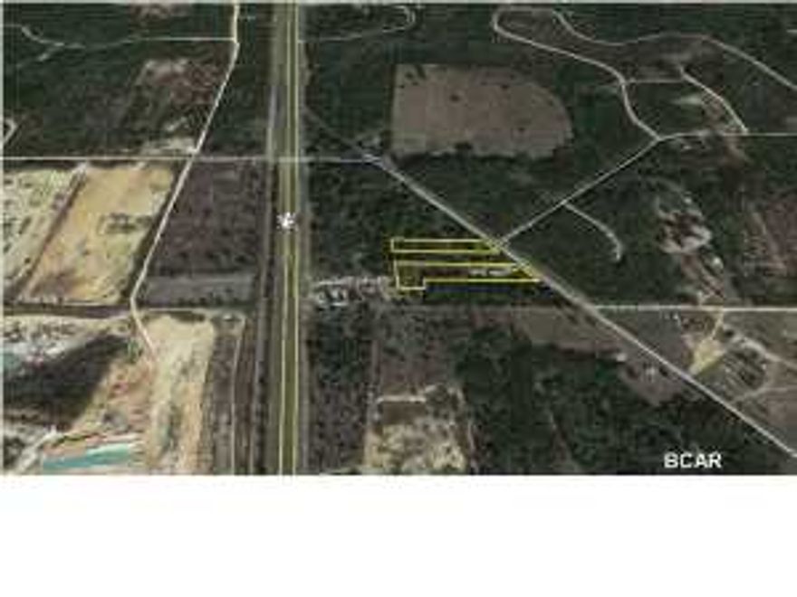 This building is conveniently located just off of Highway 231 in the Compass Lake area of Jackson County. The property is fenced with plenty of yard space making it an ideal location for construction, distribution, or light manufacturing.