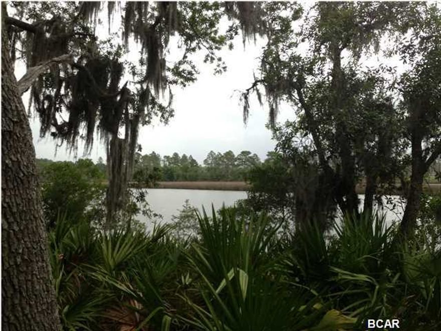 Waterfront location in Lynn Haven's Meadows subdivision. Perfect location to your build waterfront home on and enjoy nearby golf course. Lot is located near the end of the road and offers tranquility surrounded by mature oaks. All school zones and sizes are approximate.