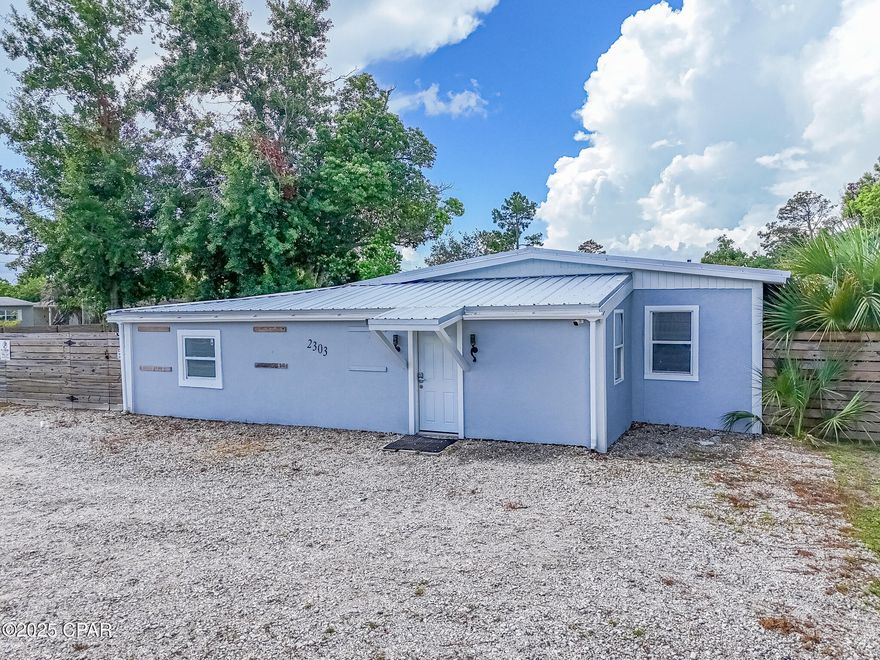 FOR LEASE - PRIME COMMERCIAL PROPERTY! This versatile MU2-zoned space is perfect for a small business and was previously used as a real estate office. The mostly concrete block building features three private offices, a copier room, bathroom, small waiting room, open conference area, and a kitchen. Each office has its own ductless split air/heat system with a remote, plus a separate system for the main area. The property offers three entrances with code locks for convenience and security, along with a gravel driveway of approximately 2,000 sq ft facing 19th Street that provides parking for six cars. The entire property is fully gated with a rolling gate and two additional gates and includes a 12x32 shed with a roll-up door. Sitting on a double lot with ample storage, this property delivers flexibility, accessibility, and privacy. Landlord pays taxes and insurance; the tenant is responsible for utilities and lawn care.