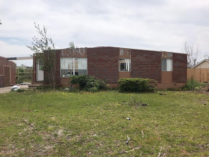 INVESTMENT OPPORTUNITY BACK ON THE MARKET!  Large Lot located on Harvard Circle in this great well established neighborhood.    House was severely damaged by Hurricane Michael and is being sold in it's ''As Is'' condition. Excellent option for a primary residence or rental that is ready for it's new owner to repair or rebuild.  Excellent location, close proximity to shopping, great restaurants, and A-rated schools.  Use safety precautions when viewing property as it has not been cleaned up since hurricane.