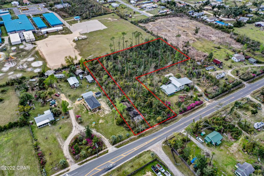 Looking for land to build multiple houses on or just want a large parcel closer to town? Check out these two lots just off Hwy 22 on Star Ave. Price includes parcels 06454-000-000 and 	06450-000-000. With over 2.5 Acres of land the possibilities are endless. This property backs up to the school and is a great location for employees of Tyndall AFB, Eastern Ship Building and more. Currently zoned R-2. There is an old house that was damaged by Michael on the property. No value is being given to the house. Buyer to purchase survey