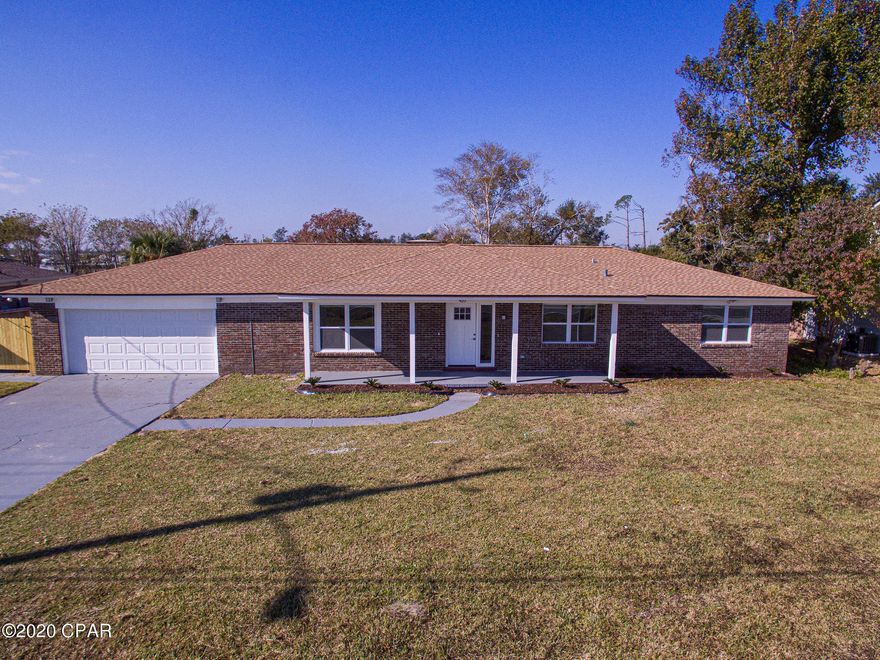 FULLY RENOVATED 4/2 in Callaway Bayou!! Conveniently located close to Tyndall AFB. New roof, new kitchen countertops, new stainless steel appliances, new cabinets, new windows, new interior/exterior/garage doors. Light gray laminated wooden floors throughout the entire house (No Carpets). Indoor fireplace in a wondrous luminous room overlooking the garden. Fully fenced backyard. BIG lot. Walk-in Closets. Separate sink & shower in master bath and in 2nd bathroom with tub. No HOA. Your dream home awaits. WON'T LAST !!!