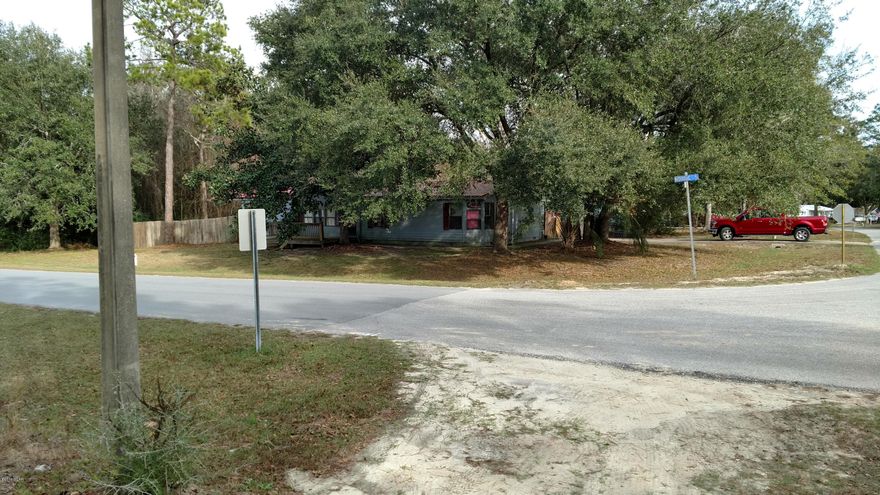 Great Potential for this home, needs a lot of TLC, perfect for the investor or handyman, has a newer metal roof, otherwise value is in the land, on a corner lot, septic and private well already in place, electric in place. Buyer to pay any and all closing costs and fees of the sellers including realestate sales commission (both sides), buyer to pay any back HOA fees,if any, recordings, taxes, etc. Buyer to do their own due diligence, all sizes and statements are approximate