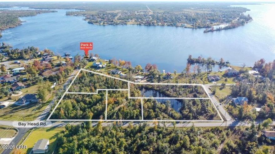 4.72 acres located in Youngstown, consisting of five parcels totaling 26 individual lots. Property is zoned R-1 Single-Family Residential, allowing for single-family home construction or use as one private estate homesite, subject to Bay County approvals.


The property is located in a low-density, rural area with limited surrounding development and minimal traffic. Deer Point Lake views are present, and the property is near a public boat ramp, providing access to freshwater recreation.


Property Details:

Total acreage: 4.72 acres

Five parcels / 26 lots

Zoning: R-1 Single Family Residential

Suitable for development or single homesite

Deer Point Lake views

Paved road frontage on Bay Head Road

Nearby lake access and boat ramp

Location & Distance Information:

18 miles to Downtown Panama City

24 miles to Tyndall Air Force Base

23 miles to Panama City Beach

30 miles to Northwest Florida Beaches International Airport (ECP)

43 miles to I-10

This property offers acreage, zoning flexibility, lake-area proximity, and a quiet setting while remaining within driving distance of major employment centers, beaches, and transportation corridors. Ideal for buyers searching for land for sale in Youngstown FL, acreage near Panama City, R-1 zoned property, or property near Deer Point Lake.

Buyer to verify all measurements, zoning, and development potential.
