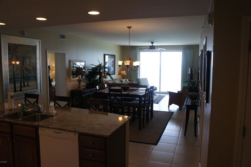 Unbelievable Windsong corner unit that boasts 1505 square feet & is appointed with the gorgeous furniture, appliances, and fixtures.  Two gigantic master bedrooms face the Gulf of Mexico & contain their own private bathroom suites.  A separate bunk room increases the sleeping capacity of this condo to 8+.  In addition, 9 ft ceilings, granite kitchen & bathroom countertops, tile floors, custom kitchen cabinets, & GE profile appliances bring this condo to the top of any buyers list.  

Splash is located on the desirable, developing west end which is near Highway 79, International Airport, lots of great restaurants, Pier Park & Santa Rosa Beach (30a). Sit back and relax on the beautiful balcony overlooking the spectacular Gulf of Mexico.  Agents, read compensation notes for unique offering Splash is the perfect family resort featuring a lazy river, heated play pools with water slides, spray toys and a pool side island style bar and grill. There is also an ice cream shop & cafe, covered parking with a sky walk to the buildings, fitness center and a surf shop. Whether you are looking for a rental, second home, or even primary residence this is a unit to be considered.