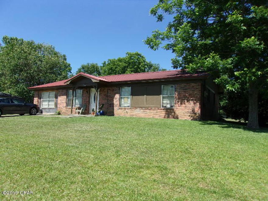'CURRENTLY UNDER CONTRACT, SELLER ACCEPTING BACKUP OFFERS' 4 Bedroom 1.5 Bath brick home on almost half acre lot. Eat In Kitchen. Nice size living room. Large laundry room. Covered back porch. Metal roof. Concrete driveway. Fenced back yard. Pecan tree. Located in the edge of town. Convenient to schools, shopping, churches and Interstate 10.  Check it out today!!