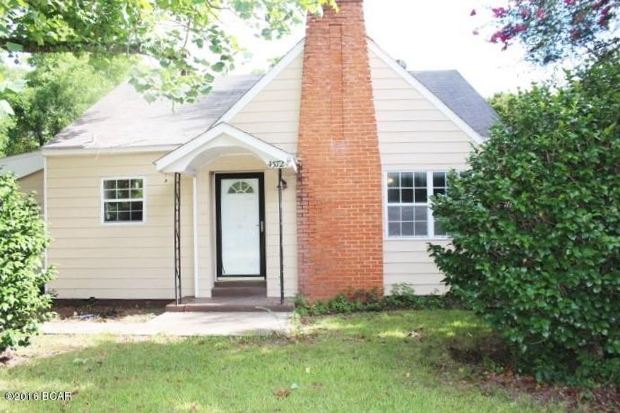 Nice, nice, nice!  This 3 bedroom 2 bath has had renovations and updates!

The location is just outside the city limits and is very convenient to town.

You have 2 bedrooms and 2 baths downstairs and a large loft bedroom upstairs that the kids would just love.

There is a large eat-in kitchen with all new appliances plus a formal dining room.  The formal living room has a fireplace and there is a large sun room as you enter the house from the carport.  There is a large yard building just right for a workshop that has a lean to for your boat and yard equipment and there is a large pole barn in the back.  There are two large fig trees, a tangerine tree and pecan trees.  Plenty of room for a large garden also!