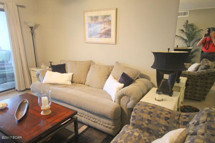 This is a must see unit.New tile floors, Kitchen Granite Counter tops, New cabinet doors, expertly decorated. Completely furnished and ready for rent, this unit is a great Gulf Front unit that over looks both pools and the Gulf. The Master Bedroom and the living room are both Gulf Front. The unit is absolutely beautiful!! The complex is gated and is loaded with amenities. There is a new Tiki bar by the two large pools. All information is believed to be correct but should be verified by the Buyer.