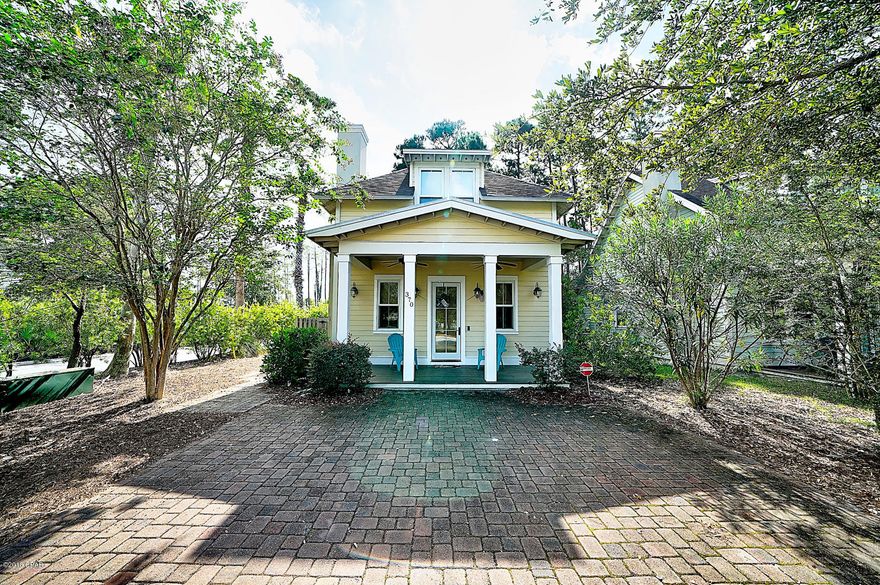 Stunning furnished Florida Cottage home in Harrison's Walk.  Location at it's best within 1/2 mile to the sandy white beaches as well as sits across from community pool.  Beautifully decorated to truly enjoy the comforts of home.  Spacious floor plan with master on 1st floor and two large bedrooms up stairs.  This cottage boasts with character from the moment you walk in the front door.  Don't miss out on this ready to go vacation home that has room for the entire family.  The bedrooms upstairs are furnished with two queen beds in each room.  New AC being installed.  Call today for your personal showing.