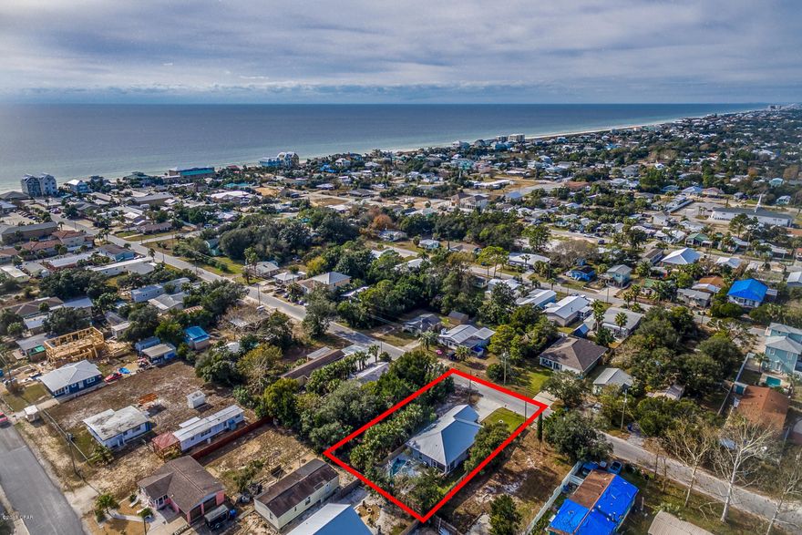 This home is a 2 minute walk from the Gulf! Newly constructed in 2017. NO HOA! Golf cart and pet friendly community, This home has it all!!. Everything in this home is just over 1 year old. Double impact windows and doors, Custom tile floors and cabinets, granite counter tops, upgraded sinks, vanities and fixtures, raised ceilings with ceiling fans throughout the home.PRIVATE SALT WATER POOL with tanning shelves, complete with custom built pool decking and tanning decks. Large screened in back porch and cozy front porch. This is the perfect primary residence home, second home, or vacation rental investment property! YOU MUST SEE THIS HOME !! You can literally stand by your mailbox, look down the street and see the OCEAN! Call today and come see this home! This home also has a projected rental income of just over 46k..Great investment property and the location is optimum!!