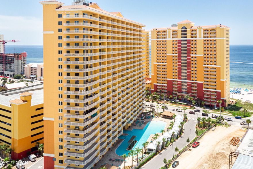 Adjacent to Pier Park and a quick walk to City Pier. Luxury interiors w/stainless steel appliances, quartz/granite counters, 9 ft. ceilings, 10 ft. wide balconies. Amenities include lagoon-style pool, large fitness center, snack bar and parking garage.