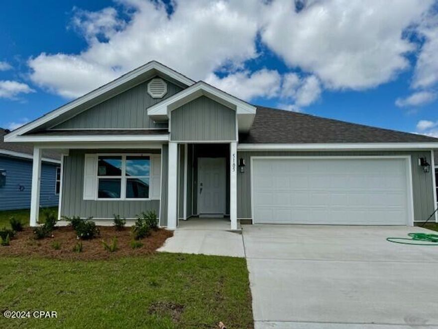 Titus Park, new construction home. This Cali floor plan is located on Lot 284 at 5105 Rivergrass Drive. This floorplan features traditional 8' ceilings, EVP flooring in all common areas of the home and carpet in bedrooms. The interior of the home also showcases a large living area with open kitchen with a center island. Elegantly appointed kitchen includes beautiful cabinetry in Ivory, name brand stainless appliances, smooth top range, dishwasher and microwave. As an added feature, this home also includes a Smart Home system, with a Skybell doorbell, Quolsys touch panel that can be programmed to control your lighting, temperature as well as secure your home. Each home includes a one year builder warranty as well as 10 year structural warranty. Titus Park is located in Panama City, Florida and only minutes away from Tyndall Air Force Base! This large scale, multi-phase community is centrally located off Highway 390 and just north of Highway 231 and is surrounded by a multitude of shopping centers, restaurants, and is only minutes from the North Bay and St. Andrew's Beaches.