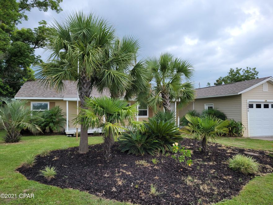 Cute split floor plan!  3 bedroom 2 bath home with large covered font porch, 1 car garage and adjoining carport.  This home features a built-in bookshelf in the living room, kitchen island and new stainless appliances, large pantry with lots of shelves and racks that also includes the laundry area with Samsung matching washer and dryer (AS IS)  This property is nicely landscaped with open patio and swing on large corner lot with privacy fenced backyard and shed (AS IS).  ALL ELECTRIC!   2 Dogs under 65 lbs. But NO DASCHOUNDS!