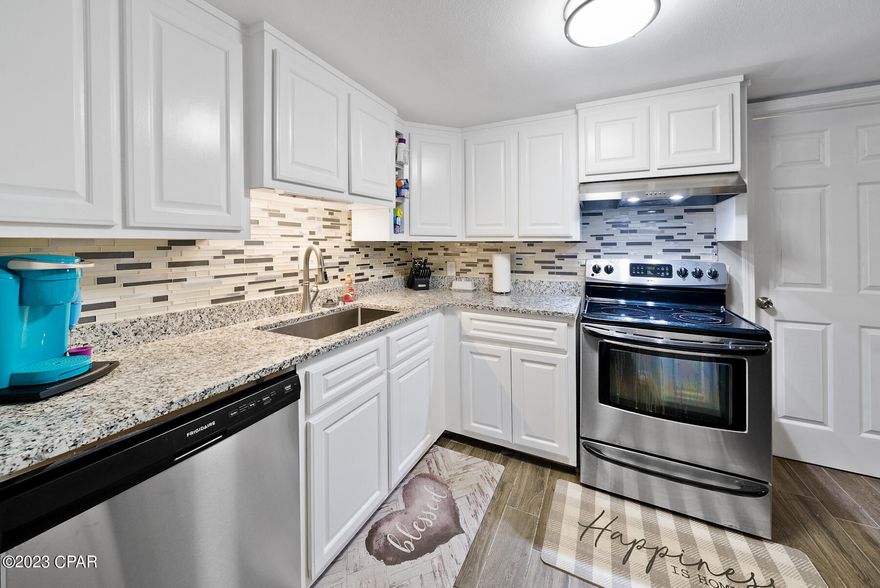 *Under Contract - Seller is accepting Back-Up offers.* Seller is eager to sell and willing to negotiate closing cost concessions or a rate buy down with approved offer. Welcome to your new Venetian Villa townhome. This desirable end-unit has been completely renovated and is move-in ready. With 3 bedrooms, 2.5 bathrooms and 1337 sqft this home makes a perfect starter home or home for a growing family. Being STR eligible it would also make a great investment property. Downstairs you have an open concept  living/dining room with ceramic tile flooring. The kitchen has been upgraded with granite countertops and lots of cabinetry. you will find a half bathroom underneath the stairs. There is a covered porch overlooking your quiet, privacy fenced backyard perfect for entertaining guests. Upstairs you have the main bedroom with en-suite and an additional 2 bedrooms and another full bathroom. This townhome is centrally located, close to shopping, entertainment, restaurants and schools. Don't wait, come and see this home today! All information and measurements are approximate and should be verified by buyer.