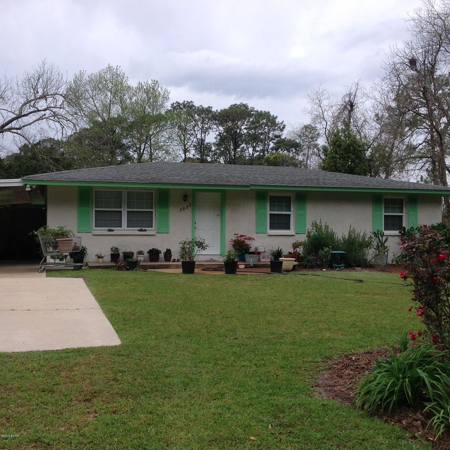 This lovely well cared for Starter Home is back on the market.  This 3/1 home features a newer roof, laminate flooring in the main living areas an updated kitchen and new windows.  There's a huge bonus room perfect for entertaining.  The home boasts an extra large yard perfect for planting your own garden - there's a wonderful potting shed/green house and well water to tend to the garden.  The home is near great schools, shopping and  Hwy 77 businesses.