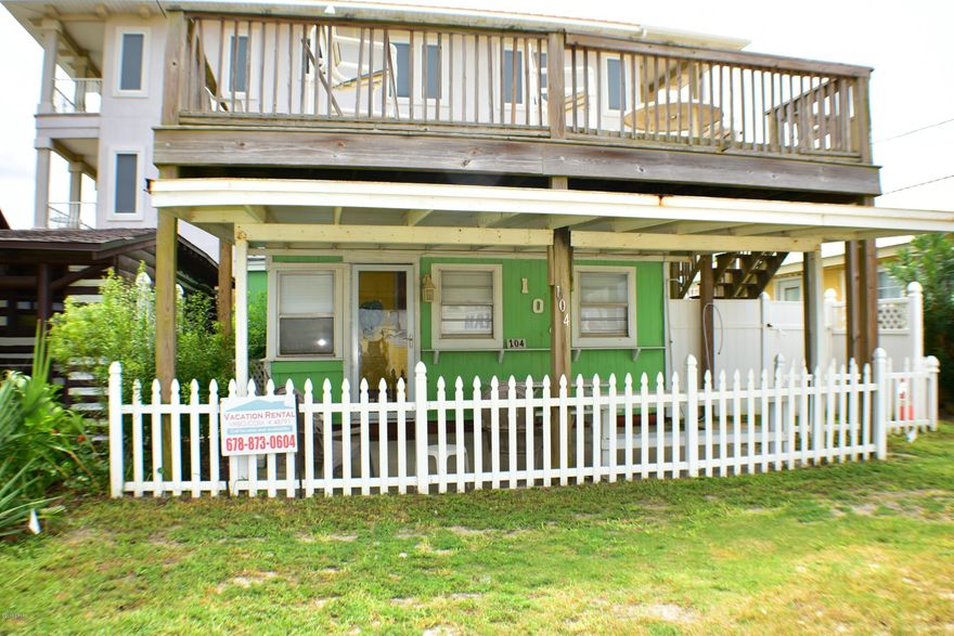 Right across the street from a dedicated beach is where you'll find this beach gem!  This is a 2BR/2BA beach cottage with gulf views from the top deck and just steps from a beach where no condos will be built!  This is currently being used as a vacation rental property but the zoning is C2- Commercial Plaza so you may have further options. Seller says all electrical has been updated and up-to-code.   The location is superb;  not only are you nearly on the beach, you are right across the street from a popular restaurant and just 10 minutes from Pier Park!   No parking issues, no HOA's, no crowds....real beach living at its best!  All info is approx. and must be verified by Buyers if important.