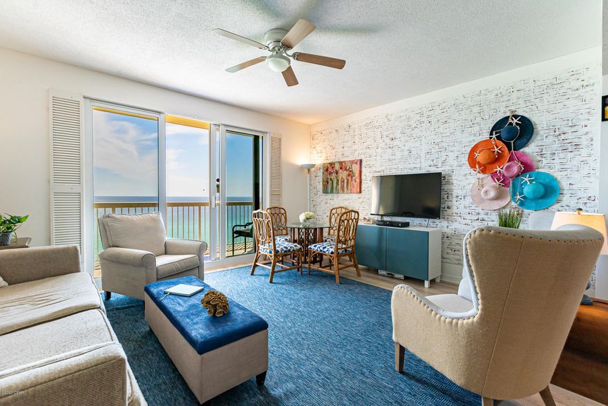 This light and airy unit is located on the 10th floor providing quick trips when wanting to enjoy the Resorts gulf front amenities while offering gorgeous panoramic views from the balcony. You are located in the thick of it all, on a quiet residential gulf front street w/ easy access to restaurants, shopping and fun family activities. The one bedroom, two bath bunk bed alcove with new sleeper sofa sleeps 6 comfortably. You will love the upgraded laminate wood flooring in the living and master bedroom, new wall papering thoughtful highlighting the bathrooms & bunk area, painted cabinets in kitchen and bathrooms along w/ grey glass tile backsplash in kitchen and brick veneer wall covering in the living room. This unit is a must see & will be rental favorite. Unit is being sold furnishe