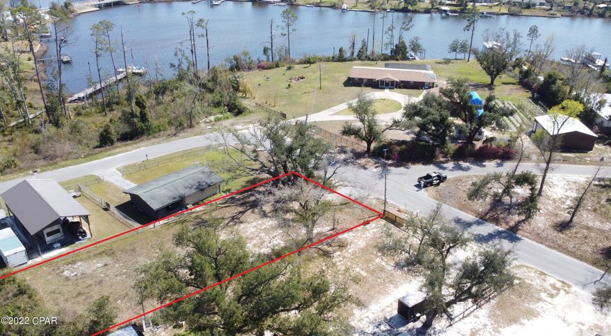 Fantastic homesite that is ready to build on. Nice sized at over 1/4 of an acre. City water and sewer, tap fees already paid. Lot is cleared and ready to go. Just a block from the water but no flood zone, high and dry. Great proximity to Tyndall Air Force Base and Mexico Beach. Just seconds from local park with boat launch to access East Bay. Nice and quiet area, a perfect location for a custom build or spec home. Build a 2 story and capture views of the bayou. Priced to sell.