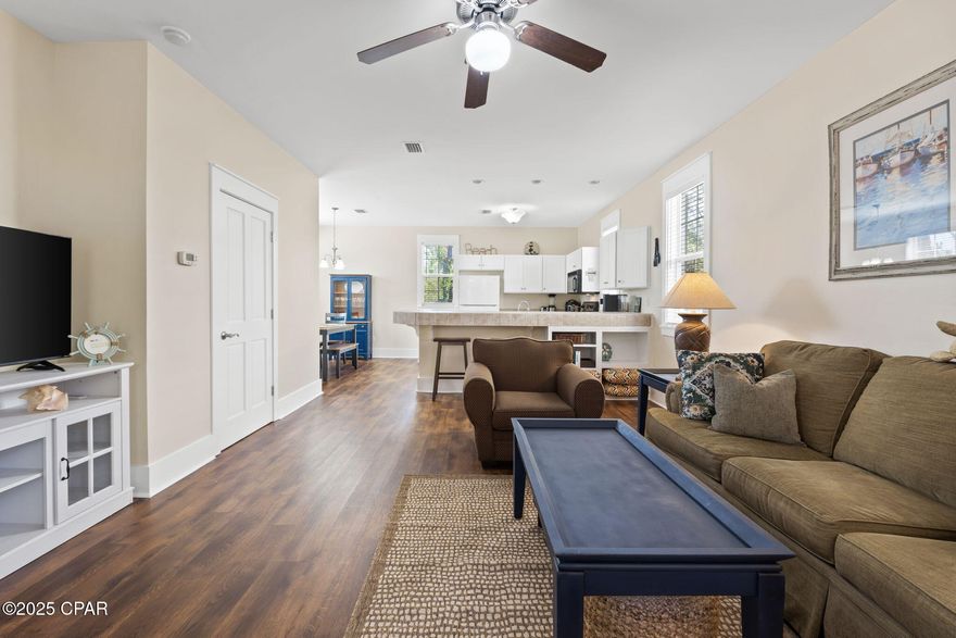 LOCATION, LOCATION POOLVIEW!! Cozy 2BR/2.5BA Florida cottage in the desirable Barefoot Cottages community! This well-maintained coastal retreat offers the perfect blend of ease and serenity. Step inside to find an open living and dining area filled with natural light, a functional kitchen with a breakfast bar, and all major appliances—ideal for laid-back coastal living.  Downstairs, you'll also find a convenient half bath, ideal for guests. Upstairs, the spacious master suite features its own private ensuite bathroom with a beautifully tiled shower and direct access to a private screened porch—a peaceful spot to enjoy the morning sunrise or evening breeze. The second bedroom is set up as a versatile bunk room, perfect for kids or additional guests, with its own full bathroom for privacy and comfort.  One of the standout features of this home is the inviting screened porch—perfect for morning coffee or evening cocktails—located just steps from the sparkling community pool. Whether you're unwinding after a beach day or entertaining guests, this outdoor space is sure to be a favorite. Barefoot Cottages is a gated community with three community pools and beautifully landscaped grounds.  Step outside the neighborhood and immerse yourself in the vibrant Port St.?Joe lifestyle—with charming shops, local eateries, and live music venues just minutes away. Outdoor enthusiasts will appreciate easy access to fishing, kayaking, and paddleboarding on St. Joseph Bay, as well as scenic nature trails and waterfront parks. This location truly offers the best of active coastal living.   Whether you're searching for a second home, vacation rental, or full-time residence, this turnkey cottage is ready for you. Schedule your private tour today and begin LIVING THE BEACH LIFE!