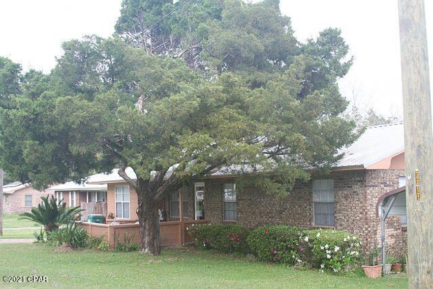 'UNDER CONTRACT-SELLER TAKING BACK-UP OFFERS''

YOU DON'T HAVE TO BRING ANYTHING BUT YOUR CLOTHES!!! This home is being sold completely furnished including a big-screen TV!!! Home is a 3 bedroom 2 bath, brick construction built on a concrete slab that has been totally renovated to over 1800 square feet heated and cooled.  New custom cabinets granite countertops, new flooring, recently painted, a galvalume metal roof.  It features a 14' x 32' deck with railing across the rear of the home overlooking a fenced back yard.  Grapefruit trees, Persimmon, and Japanese Plum are growing in the back yard.  City Water, Sewer, and Garbage service, along with the availabilty of cable tv, and high speed internet service. Located on a paved street in Bonifay.  Call for a showing today!!!