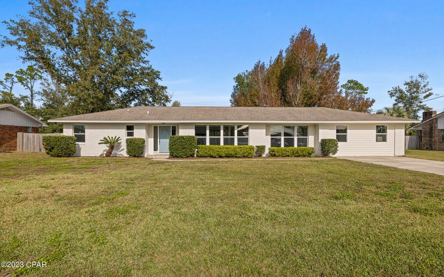 Freshly updated!!!  2 PRIMARY BEDROOMS on opposite sides of home.  Excellent for large families, rental or home offices.
An older, well-built home that feels BRAND NEW...yes, PLEASE!  This centrally located beauty is nestled in a quiet area of desirable Lynn Haven with quick access to big box stores, hospitals, schools and the World's Most Beautiful Beaches.  Beautifully finished down to the closet systems!  Large yard with mature trees providing all-important shade in the Florida heat are the cherry on top!  NO HOA and outside city limits.  Short term rental ALLOWED!  BUYER TO VERIFY ALL INFORMATION DEEMED IMPORTANT
