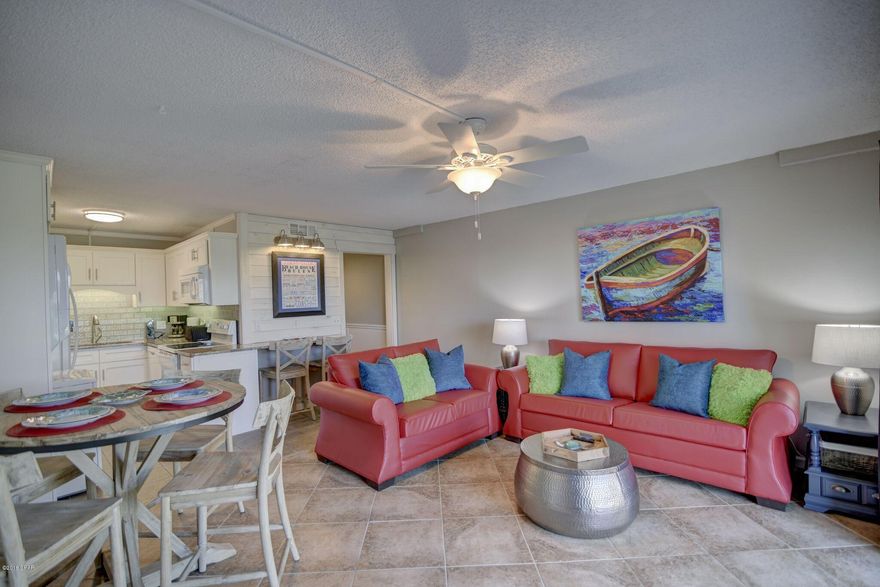 Waste no money, stress or time on the elevator with this adorably renovated ground floor unit close to the community pool and beach access. This bright and cheerfully decorated unit has one-bedroom with a bunk, 1.5 baths and little extras like shiplap and a renovated kitchen to set it apart. Sold furnished and ready to go, all you have to do is move in or collect the rent money! Enjoy condo amenities at a reasonable price and a great location close to PCB east end hot spots like St. Andrews State Park and more. Some misc items in the owners closet wil not convey. All measurements are approximate.