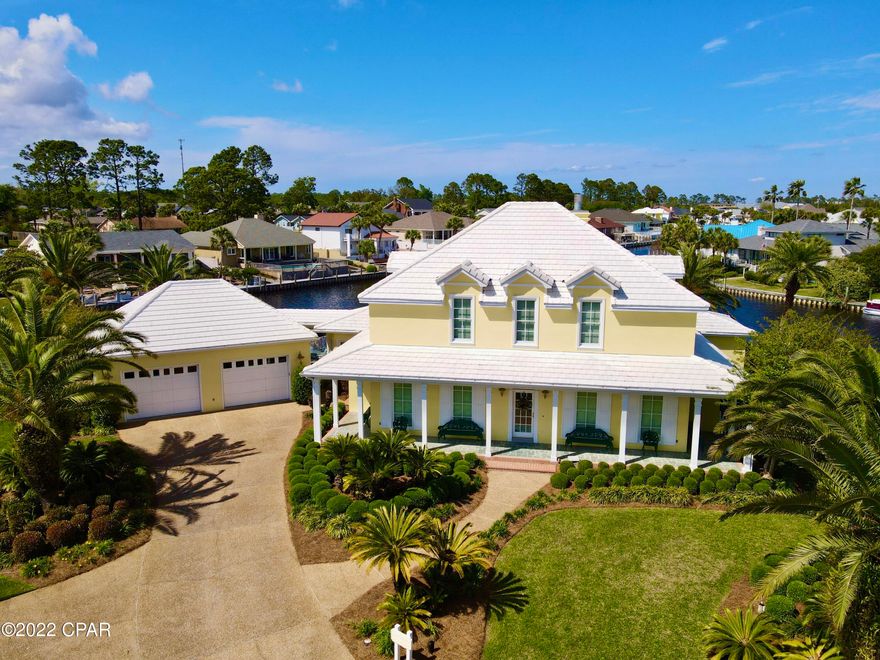 The best of everything. This well appointed home sits on two lots at the end of a cul de sac and has over 270 feet of water frontage and a boat lift. The social kitchen has Gaggenau induction cooktop and double ovens and a subzero refrigerator. There is ample storage everywhere. The back side of the house takes full advantage of the incredible view. There is new flooring throughout the first floor. Double pane, impact resistant windows all around the home. There is crown moulding everywhere. The master suite has one huge closet and two large closets in the master bath. The master bath has heated floors and the shower walls are solid marble, not tiles. The bedrooms are all a very nice size and there's even a third floor study/game room. The oversized two car garage is climate controlled.