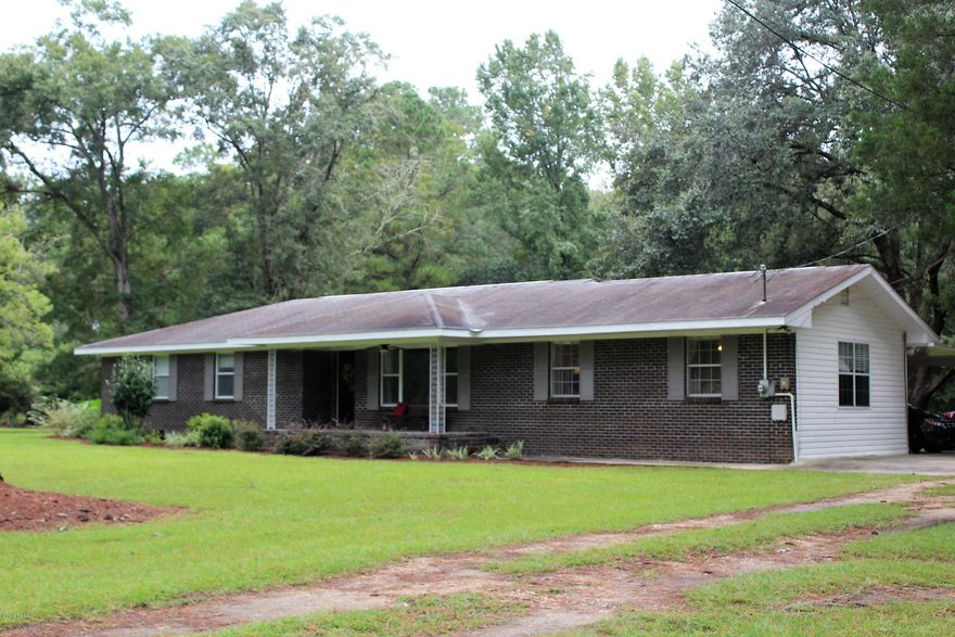 Bright and spacious 3 Bed/2 Bath home in quiet neighborhood. All the updates have been completed just bring your family and move in! Very large dining kitchen area with windows along the back wall looking out into huge back yard. Separate living area and Laundry room/mud room provide added space. Outside features Storage/workshop,

fruit trees, a grape arbor and garden area. Home is located on 2.8 acres. You really must see this one to appreciate! Please call Listing Agent to make an appointment to see.

*All measurements are approximate and must be verified by buyer if important.