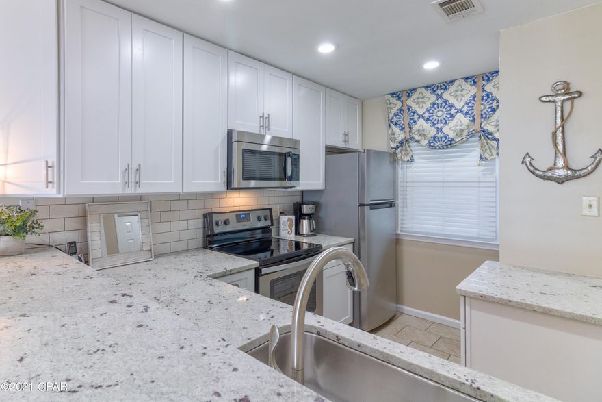 Rare opportunity to own a beautiful 2 bedroom, 2.5 bath gulf front condo that has been completely remodeled by interior design specialist on the far West end of Panama City Beach.  Ramsgate Harbour is a low rise, gulf front condo with a town house feel. This quiet community has only 66 units, is located on 550 feet of gorgeous private beach, and offers a gulf front pool with grills and restrooms.  Covered parking below the building offers protection from the weather year round.  



Ramsgate Harbour is located adjacent to Carillon Beach and only a few minutes drive from Inlet Beach on 30A.  Head West to quickly enjoy all that 30A has to offer or take short drive east for the entertainment and restaurants around Pier Park. What a gre Unit 20 was professionally remodeled in 2019. You will find an open kitchen with all new stainless appliances, new shaker cabinets, and beautiful Colonial White granite countertops.  The kitchen looks into the den and out onto your private covered deck above the sugary white beach.  The first floor also includes laundry with new washer, dryer and an updated half bath. 

The second floor has two bedrooms and two baths with updated cabinets and granite counter tops.  In the gulf front master bedroom you will enjoy another private covered balcony, large closets, and a well-appointed private bath.  The secondary bedroom is spacious with its own bathroom. 

There is a private lock out closet on both floors for owner's supplies.  One additional lockout closet on the second floor is for housekeeping, linens, etc. 

This property has been well loved and cared for.  Ramsgate Harbour Unit 20 has a great rental history with repeat renters.  Unit 20 is being sold with its beautiful furnishings and kitchen supplies. Come and enjoy the amazing beach any time while earning rental income when you can't be here.  

Buyer to verify all measurements if important.