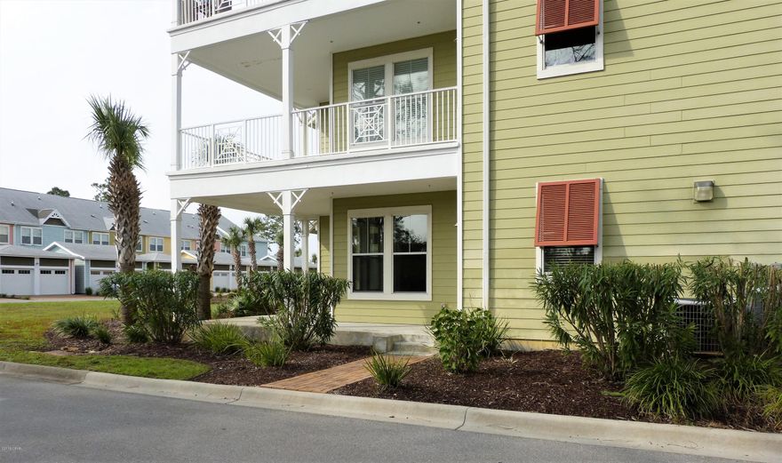 CURRENTLY UNDER CONTRACT, SELLER ACCEPTING BACKUP OFFERS. Enjoy condo living at its finest in this ground floor, corner unit, with wrap around patio, yard and palm trees and close to the garage entrance.  Gated community. The unit is move-in ready and features lots of added storage and shelving, updated ceiling fixtures, and an upgraded double shower. The spacious living/dining room has crown molding with bamboo flooring. The kitchen features granite countertops and stainless steel appliances. The grounds have sought after amenities including tropical landscaping, one acre lagoon style pool with fountains, splash pad and hot tub, garage parking, game room, fitness center and basketball court.   All measurements are approximate. Please verify if important.