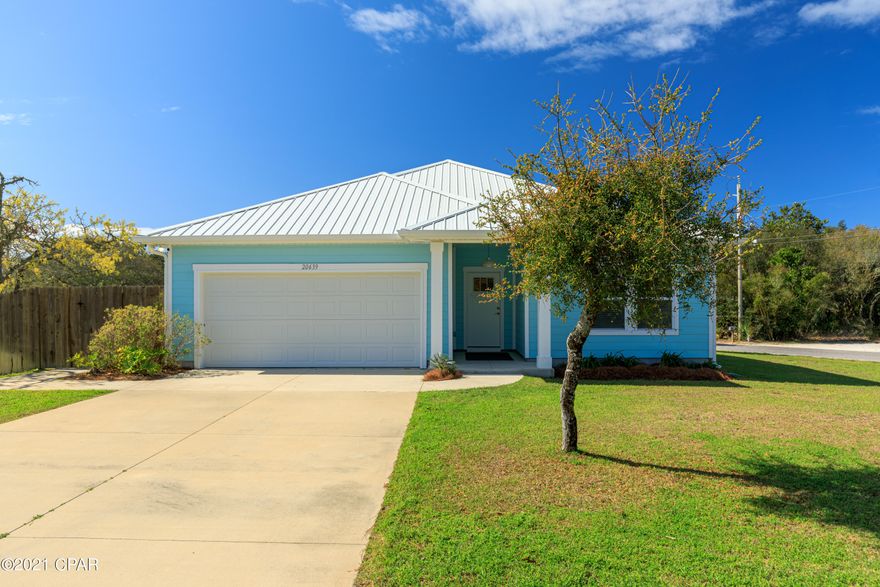 This is a BEAUTIFUL home located less than 3 blocks from the beach.  The home is very well maintained and has been well taken care of.  The home has many fabulous EXTRAS!!  Spacious 2 car garage, outdoor shower with hot water, large screened in back porch, gorgeous kitchen with top of the line appliances and so much more.  There is room for a  pool in the back yard and the fence is already in place.  All information is deemed correct, but buyer needs to verify.