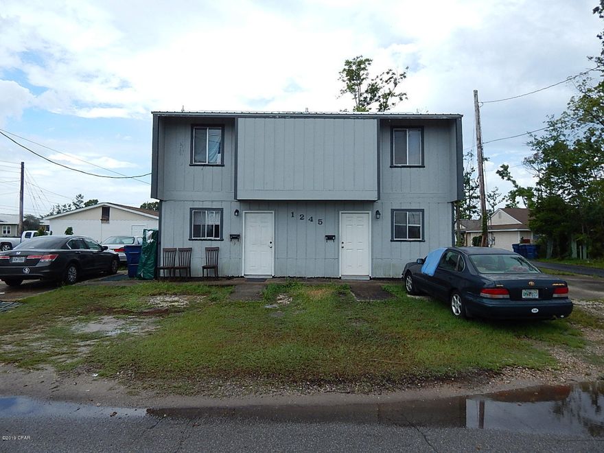 Here is your opportunity to Rent the remaining building to cover purchase costs while you are building a brand new Duplex on the East Lot. All utilities are in place and capped just waiting for you to start. Duplex C & D has a brand new Metal roof and some minor repairs have been made inside. According to the seller the interior of the remaining property needs to be renovated and once done rents could be much higher because of the central location of the property. The remaining Duplex has tenants that are month to month and would be willing to sign long term lease. The property is being professionally managed.  You don't have to have another duplex on the vacant pad, build whatever you wish with in the zoning established by the city.