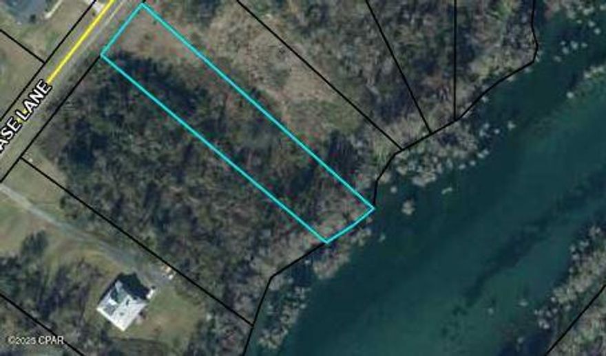 Discover the serene beauty of waterfront living with this pristine vacant lot situated in the Spring Chase subdivision, nestled on the shores of Merritt's Mill Pond in Marianna, Florida. This idyllic property offers a rare opportunity to build your dream home on a generous parcel of land, boasting breathtaking views of the crystal-clear, spring-fed waters that span across 202 acres. With direct access to the tranquil Merritt's Mill Pond, enjoy a variety of water activities right from your backyard. Whether it's kayaking, canoeing, or simply basking in the natural splendor, this lot promises an aquatic paradise. Surrounded by towering cypress trees draped in Spanish moss, the lot provides a picturesque setting that encapsulates the essence of Florida's natural beauty. Experience the allure of waterfront living where every day feels like a vacation.