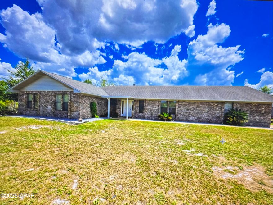 Beautiful home,  in a centrally located neighborhood  which is  convenient to Tyndall AFB,  Panama City, and a short drive to the beach. Near restaurants and shopping.  This Home is brick with 3 bedrooms and 2 baths, has a fenced in backyard, 2 car garage, large metal workshop/storage building. Home will have a new survey at closing. The adjacent 40 LOT  Mobile Home park, is available for sale, but NOT part of this sale,  SEE MLS 776399
Don't miss seeing this home. Call you agent today.