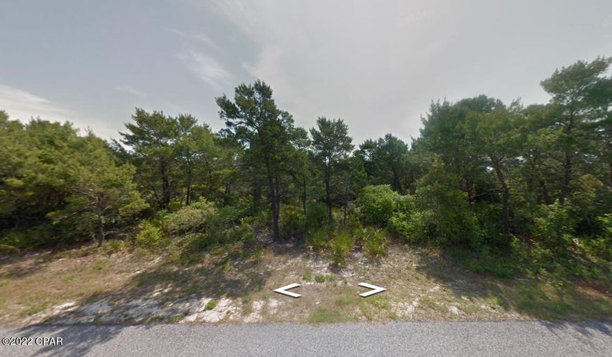 Beautiful, newly cleared, buildable lot on the desirable west end of Panama City Beach. This lot is the cheapest buildable lot on the west end! Buy this lot today and start building your dream home! Lot is located just minutes from Pier Park and 30A. This home has public water available. Septic will need to be installed. Get this lot today before its gone.
