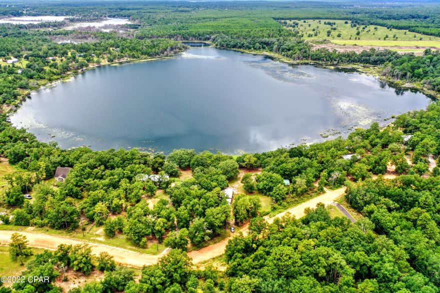 Lake Front! 2807 Summer Drive, Gorgeous, spring-fed Summer Lake in Washington County. 20 mins from Lynn Haven, 30 mins from Chipley, fantastic location for a primary residence or a lake-house. Far enough away for peaceful living and close enough to zip to town for groceries, restaurants, and doctors. Boats and Waverunners allowed! 1.74 Acres, completely fenced, has 1 room / 1 bath with covered porch, 3 bay pole barn, plenty of space for boat, tractor, WaveRunner, and huge bonus - already has power, septic, well, cable and internet, plus a gazebo right on the lake. Property on Summer Lake does not come available often, take advantage of this opportunity today!