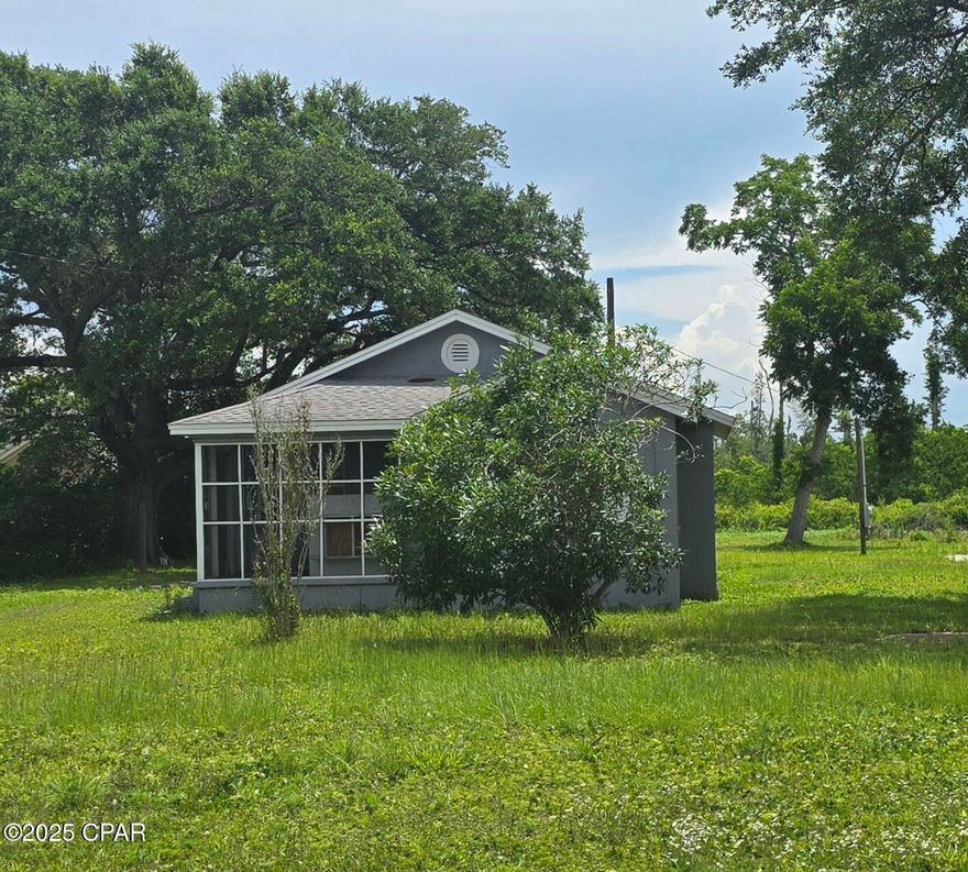 Investment Opportunity or Fixer Upper
Over 1 acre offering possibility to build 2 single family residences or possibly put a small subdivision in of 8 single family homes.
(Verify this information with the County)
The existing home has 3 bedrooms 1 bath, screened porch but home  is in need of repairs.
Endless possibilities with a great location in Highland Park  close to 231, Lynn Haven, Mosley, Highland Park Elementary, and Worship.  Possible short term owner finance with substantial down payment.