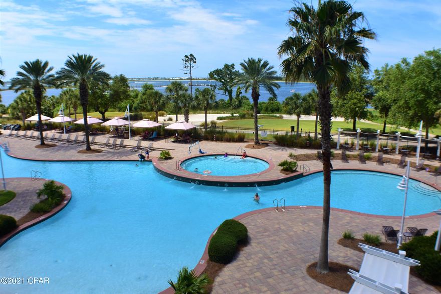 CURRENTLY UNDER CONTRACT, SELLER ACCEPTING BACKUP OFFERS. Absolutely gorgeous inside & out is the only way to describe this 1BR/1BA unit in Reflections at Bay Point!  Seller spared no expense in upgrades & design & you will fall in love with the million dollar view!  The unit boasts an open floor-plan with plank flooring, crown molding, granite countertops, rich cabinetry, large bath with dual access, double sink vanity, custom tiled walk-in shower, & the bedroom has a trey ceiling.  When you step out on to the balcony, you're greeted with a fantastic view of the freshly redone pool area, the golf course, & St. Andrews Bay!  Bay Point is a gated community with golf & tennis, 24 hour security, parks &  playgrounds, & the full service marina and  boat launch are currently being rebuilt.  All verified by Buyers if important.