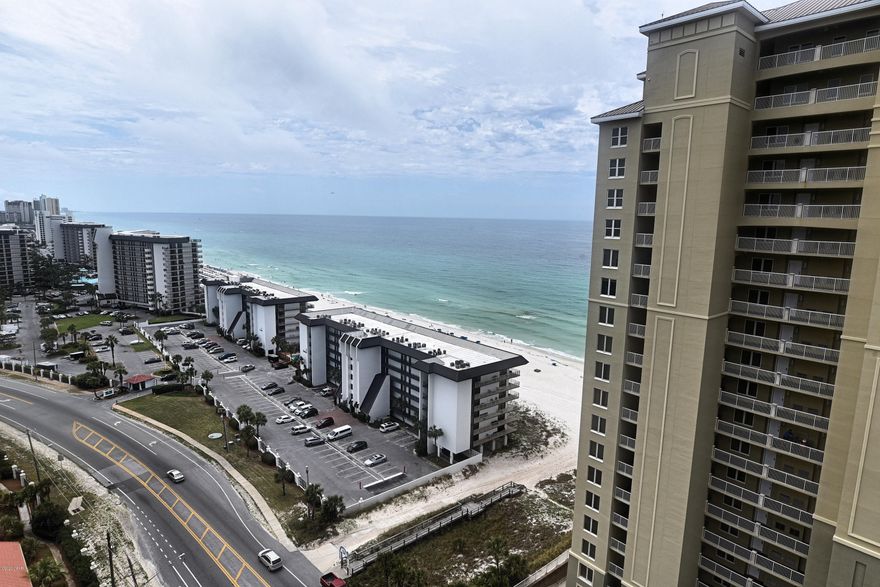 Gulf view condo for sale at Grand Panama Beach Resort. The corner balcony is full of beach views and sea breezes. Offered fully furnished and ready to earn rental income. Pretty kitchen with breakfast bar island, stainless appliances, granite counters, tile backsplash, pendant and under counter lighting. You will find high ceilings and 20'' tile flooring. Bedroom, bunk beds and sofa pull out sleep 6 comfortably. Bedroom features a king bed, flat screen TV, private bathroom with walk-in shower, double vanity. Exclusive amenities include Gulf-Front Pool and Hot Tub, Terrace Pool, Gym, Owner's Lounge. Storage for beach items in the parking garage. Good management with reasonable HOA fees. Central location walkable to dining, shopping, entertainment. Short tram ride to Pier Park!
