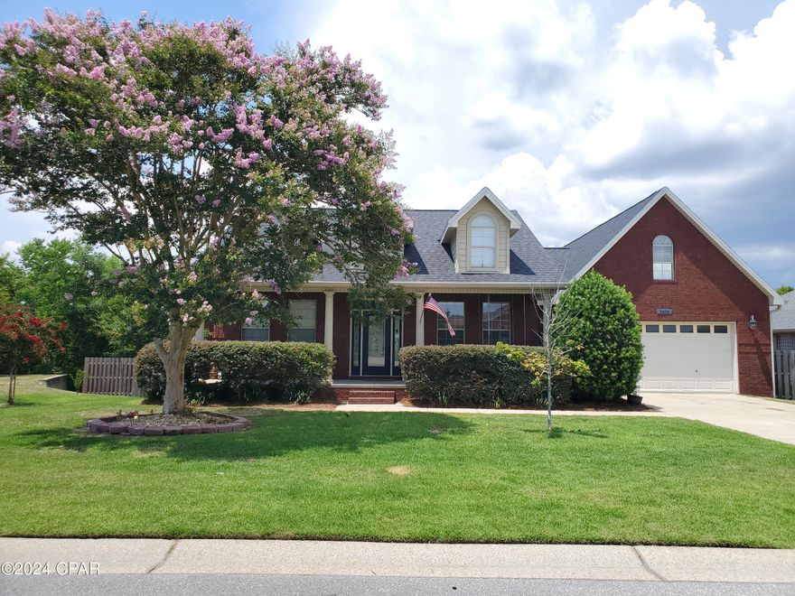 Come and see this beautiful colonial, brick home in Hillcrest subdivision. The front porch has a swing with a welcoming sense of nostalgia and charm; a way to relax and unwind. The home atmosphere is as it looks, warm as it is also bright. Majority of the rooms feature monochromatic colors that gives a refine look of energy and sophistication. The living room has a French door opening to a screened back porch; the main room also features a French door opening to a huge back deck. The back deck overlooks a spacious fenced backyard with a professionally built two story playhouse, fruit trees, herbs, chicken coop, and sheds. The garage is built for two cars and is also roomy for storage. Schedule a showing to witness it for yourself.