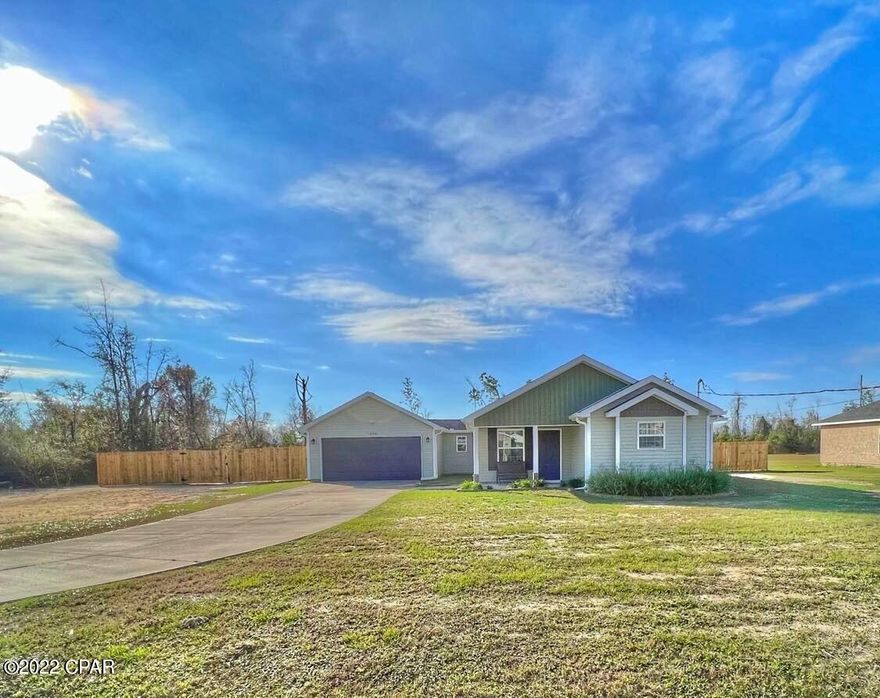 Beautiful 4 bedroom/2 bathroom newer construction located 15 mins from Tyndall AFB on a huge 1 acre lot.  Quiet neighborhood with no HOA!!  Home security camera/doorbell, Culligan whole home water filtration system, CAT5 internet lines.  Entire lot was professionally leveled and backyard was fenced-in 3 months ago and is perfectly setup for a pool, workshop, garage, or all 3.