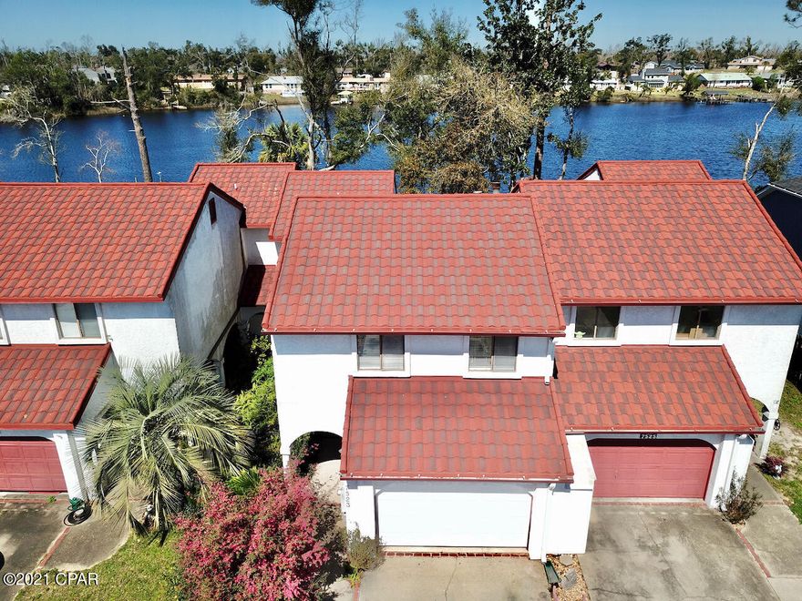 'CURRENTLY UNDER CONTRACT, SELLER ACCEPTING BACKUP OFFERS' Here's your chance to own this magnificent waterfront townhome! Watch the Dolphins play in your backyard as you sip your morning coffee! With spectacular water views and your own private dock. You also have access to the Bay/Gulf! This 3 bedroom 2.5 bath unit has a list of upgrades! From the upgraded kitchen with granite countertops and stainless steel appliances to the tile and updated bathrooms and vanities. More updates/upgrades as follows, 2013 Added insulation to attic to bring to R13. 2014 New hurricane strength garage door, 2016 New A/C inside/out also replaced some duct work, 2017 New metal roof (Has been inspected since Hurricane Michael and is in great shape) 2019 New 40gal electric water heater and in 2019 chimney cleaned and inspected post Hurricane Michael.This unit is a must see and wont last long! schedule your showing today!