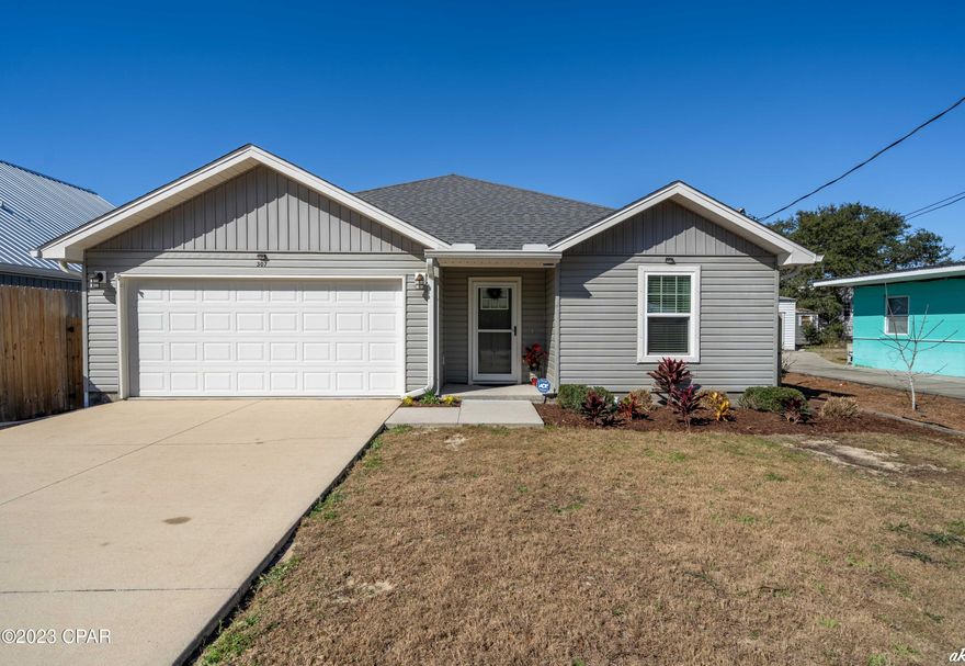 CURRENTLY UNDER CONTRACT, SELLER WILL CONSIDER BACKUP OFFERS || Beautiful 3 bed, 2 bath home on the West End of Panama City Beach! Just a direct 3 block walk to the white sandy beaches! Short-term rentals are allowed! Hot tub and washer/dryer conveys. This home welcomes with a large entry-way foyer leading to the spacious living area with a modern accent wall and double doors leading to the screened-in patio. The living room, kitchen, and dining area features an open floor plan, perfect for hosting family and friends. The kitchen is equipped with granite counters, stainless appliances, recessed lighting, and plenty of white shaker cabinets for storage. This home features a split bedroom floorplan, offering plenty of peace and privacy. The primary bedroom also features a modern accent wall, tray ceilings, and shoji doors leading to the private ensuite bathroom. The private primary bathroom features a double vanity with granite counters, a large walk-in closet, a walk-in shower, and a private water room. The additional bedrooms are spacious and share a full guest bathroom with a shower/tub combo, a vanity with granite counters, and a linen closet. This home features LVP flooring in the main living areas and carpet in the bedrooms. Coastal trim throughout. The patio has been screened-in and boasts a trex-deck and hot tub, perfect for enjoying the Florida weather in privacy! This home is just a short drive to the desirable 30A community including Alys Beach. This home is also just a short drive to Pier Park featuring shopping, an amphitheater, The Grande Theatre, The SkyWheel and plenty of eye-catching restaurants! This home would make a fantastic investment or primary residence. Check out this home today!