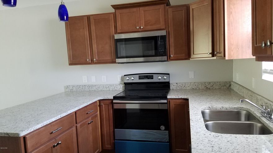 For Rent! 2BR/1.5BA townhome centrally located near Tyndall Air Force Base. Unit has been completely renovated including vinyl plank flooring throughout, granite countertops, and new stainless steel appliances. Unique floorplan features 2 bedrooms and full bath downstairs, and open floor plan living room, kitchen, and half bath upstairs. Washer/dryer connections. Contact 850-233-7926 for more information today!