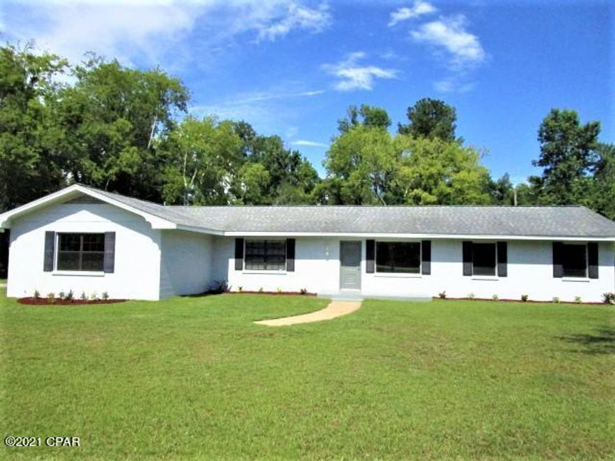 CURRENTLY UNDER CONTRACT, SELLER ACCEPTING BACKUP OFFERS.  Wonderful home within walking distance of Veteran's park and the new Liberty County High School and two minutes from Tolar Middle School.  Enjoy the privacy of one acre in town surrounded by mature trees.  This three bedroom two bath home sits on over one acre with a storage barn.  The new paint, landscaping, LVP flooring and light fixtures make this home move in ready!  Don't miss out on your opportunity to own this updated home on over an acre so close to everything in Bristol with the feel that you are miles away from everyone.