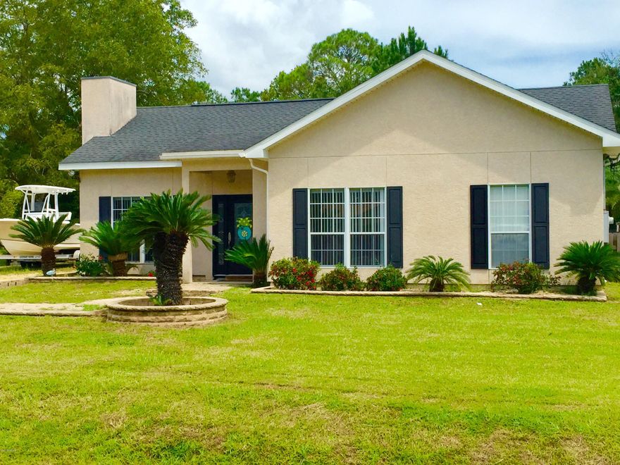 GREAT HOUSE ON LARGE LOT WITH AN IN GROUND SALT WATER POOL! INTERIOR FEATURES INCLUDE A SPACIOUS LIVING ROOM WITH FIREPLACE AND CATHEDRAL CEILING, KITCHEN WITH EAT IN DINING AREA AND BREAKFAST BAR. THERE IS AN ADDITIONAL DEN WITH BEAUTIFUL BUILT IN BOOKSHELVES AND PATIO ACCESS. THE MASTER SUITE FEATURES 3 LARGE CLOSETS, HARDWOOD FLOORS, DOUBLE VANITY AND SEPARATE TUB AND SHOWER.  THE ADDITIONAL TWO BEDROOMS HAVE LARGE DOUBLE CLOSETS WITH DECORATIVE STORAGE ABOVE.  THERE IS ALSO AN ADDITIONAL HEATED AND COOLED ROOM OFF THE GARAGE THAT WOULD MAKE A PERFECT CRAFT ROOM, GYM, HOME OFFICE OR PLAY ROOM! NO CARPET IN THE ENTIRE HOUSE...HARDWOODS IN MAIN LIVING ROOM, LAMINATE IN DEN AND TILE IN THE BATHROOM HELP TO MAKE THIS A LOW MAINTENANCE HOME. !EXTERIOR FEATURES INCLUDE LANDSCAPED YARD WITH IN GROUND SALT WATER POOL BY COX POOLS, OUTDOOR SHOWER AND EXTRA STORAGE AREA, REAR PRIVACY FENCE AND OVER FLOOR PARKING AREA PERFECT FOR BOAT OR MOTOR HOME.  THIS HOME IS CONVENIENT TO SHOPPING, RESTAURANTS AND AREA HOSPITALS.  CALL TODAY FOR YOUR OWN PRIVATE SHOWING APPT.