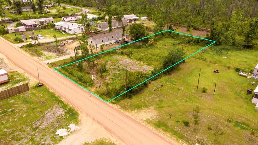 Half acre of land ready to place your mobile home with Septic and well on property, Zoning: R-2 Duplex/Manufactured Housing.  All measurements are approximate, please verify if important.