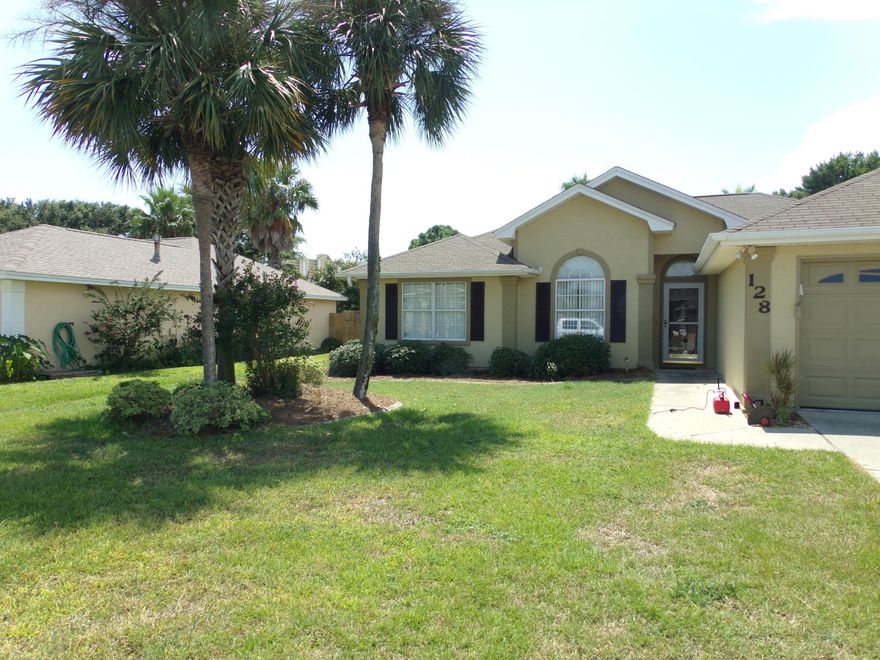 SUMMER BREEZE, a nice quiet restricted neighborhood right in the heart of the beach. UNDERFROUND UTILITIES AND STREET LIGHTS. This is a very nice 3-Bedroom, 2-Bath home and it comes completely furnished and ready to walk into with your suitcase and bag of groceries.  Perfect retirement home, second home, or the perfect option for a storm displaced family. This home comes complete with a gorgeous pool and deck area and an enclosed Sun Room.  The open kitchen has granite tops, tiled backsplash,  a nice breakfast bar and an adjoining breakfast room.  Nice 10-foot ceiling in the dining and living room.  The living room also has a fireplace.  The master bedroom and bath has a separate entrance out onto the pool deck.  Nice landscaping, a tall privacy fence, and plenty of deck area gives you an ideal area to entertain in.  Walk or take a golf cart through your neighborhood to a beach access.  Summer Breeze is close to everything including all the city offices, grocery stores, and Pier Park.  This is a great set up ready for someone to make it their permanent home or beach second home get-a-way.  Forgot to mention the pool is heated with gas for off-season use.